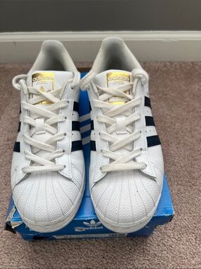 Adidas Superstar Sneakers in White with Navy and Gold Accents size 5.5 Big Kids